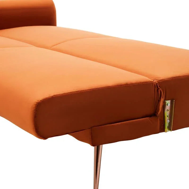 Orange fabric sofa bed with metal leg and visible stitched details, shown in extended position