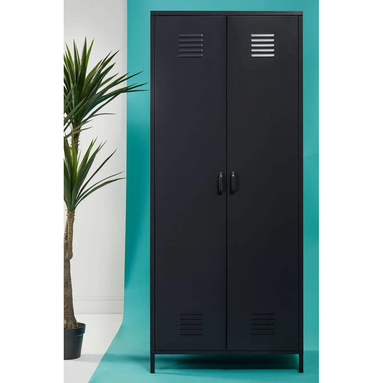 Tall black metal storage cabinet with double doors and vented panels, indoor setting
