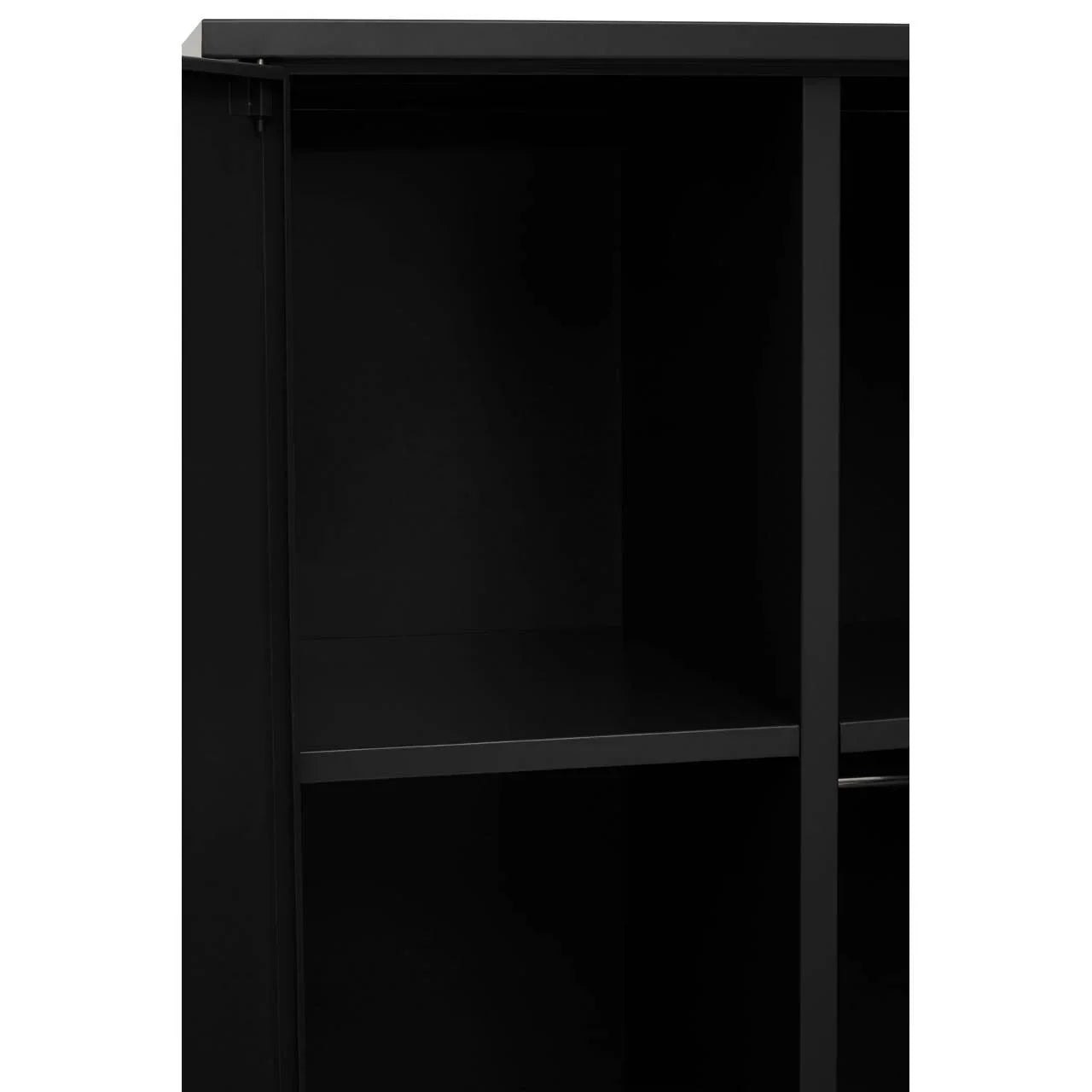Black storage cabinet interior with adjustable shelf and clean modern lines