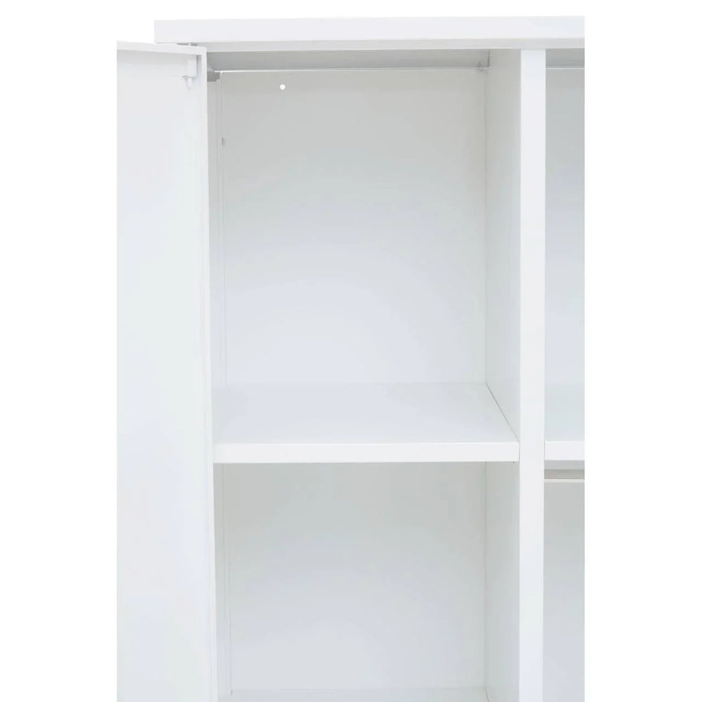 White wardrobe interior with hanging rail and shelf compartments