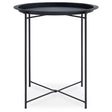 Round black metal side table with a shallow tray top and slender, crossed legs for support. The design features a minimalist aesthetic, suitable for various home decor styles