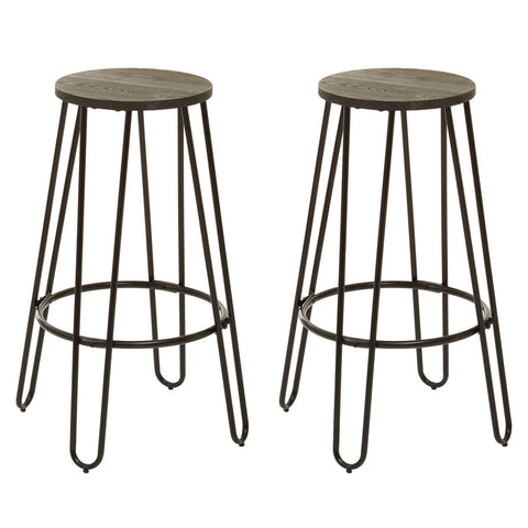 A three-piece bar table and stool set featuring a round wooden tabletop with a distressed finish and two matching metal stools with slender legs and circular seats, designed for a modern and stylish look