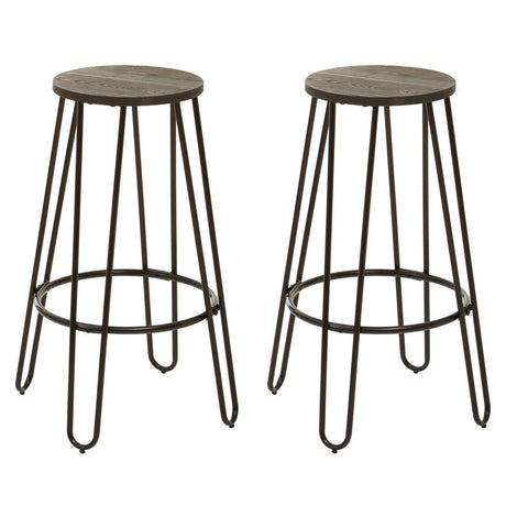 A three-piece bar table and stool set featuring a round wooden tabletop with a distressed finish and two matching metal stools with slender legs and circular seats, designed for a modern and stylish look