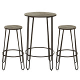 A three-piece bar table and stool set featuring a round tabletop and two matching stools, all with a rustic wood finish and slender metal legs. The stools are of varying heights, designed for casual seating around the table