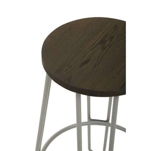 Round wooden seat with a dark finish, supported by a sleek grey metal frame featuring slender legs and a circular footrest. The design is modern and minimalistic, highlighting the contrast between the wood and metal materials