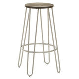 A barstool featuring a round wooden seat and slender silver metal legs, designed with a minimalist aesthetic. The legs are arranged in a geometric pattern, providing stability and a modern look