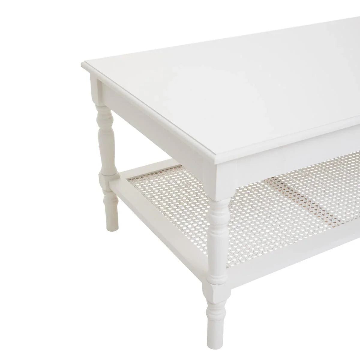 White coffee table with turned legs and cane shelf, angled corner view