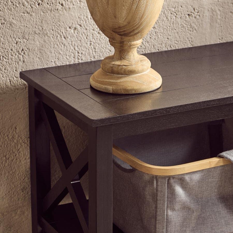 Dark wood console table with cross side detail and fabric storage basket underneath