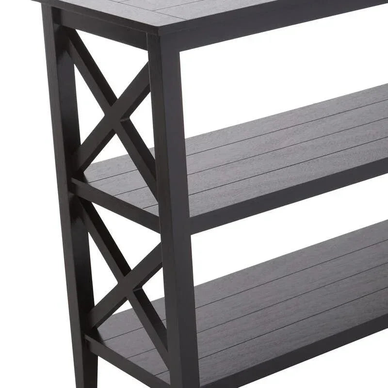 Black wooden console table with X-frame sides and three shelves, angled side view