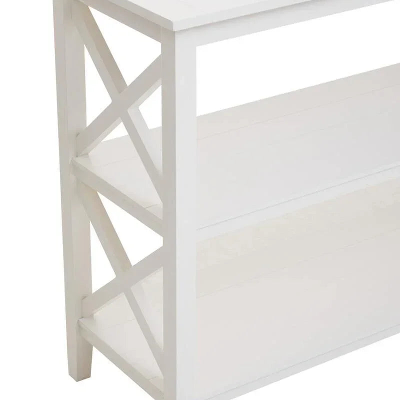 White wooden console table with shelves and cross side detail