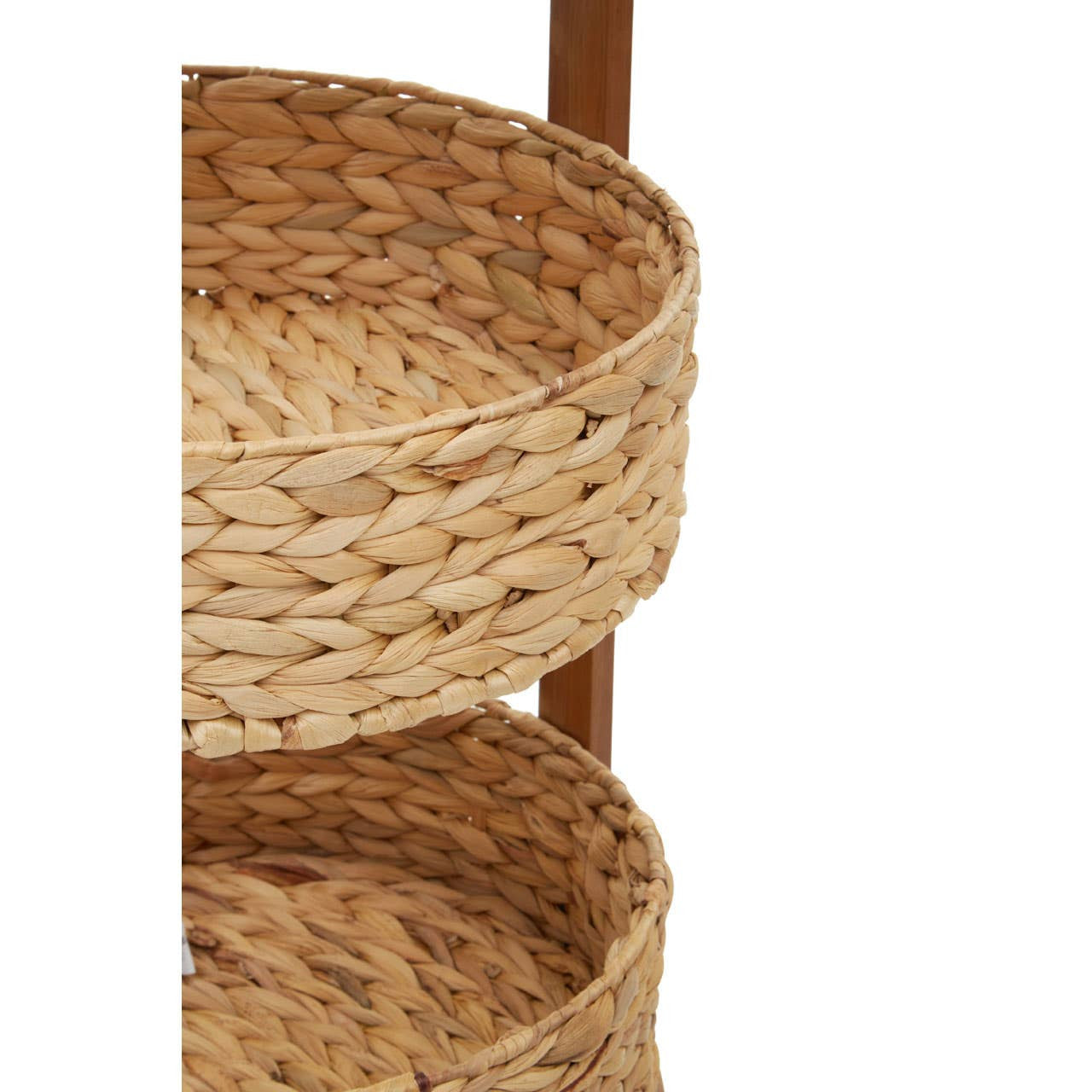 Three woven water hyacinth baskets stacked on a wooden frame, showcasing a natural texture and earthy tones, ideal for storage and organization in home decor