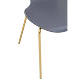 Grey dining chair with curved seat and gold metal legs, close-up angle