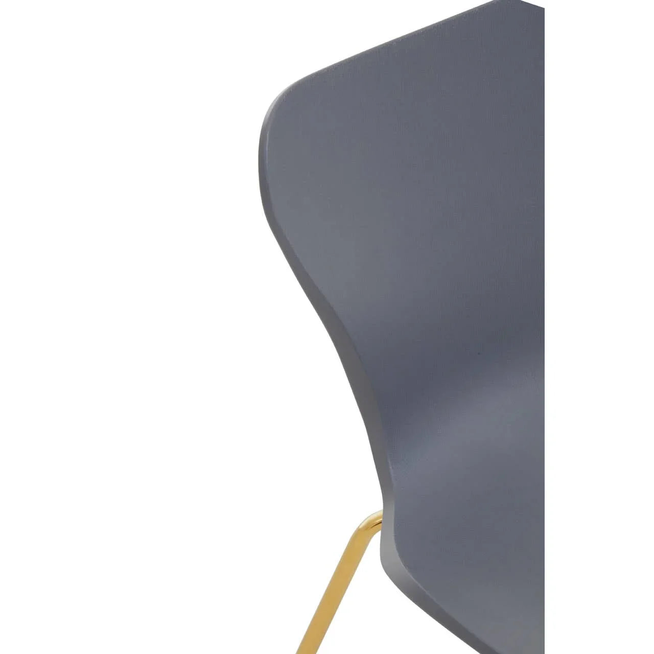 Grey dining chair with gold metal leg and curved backrest close-up