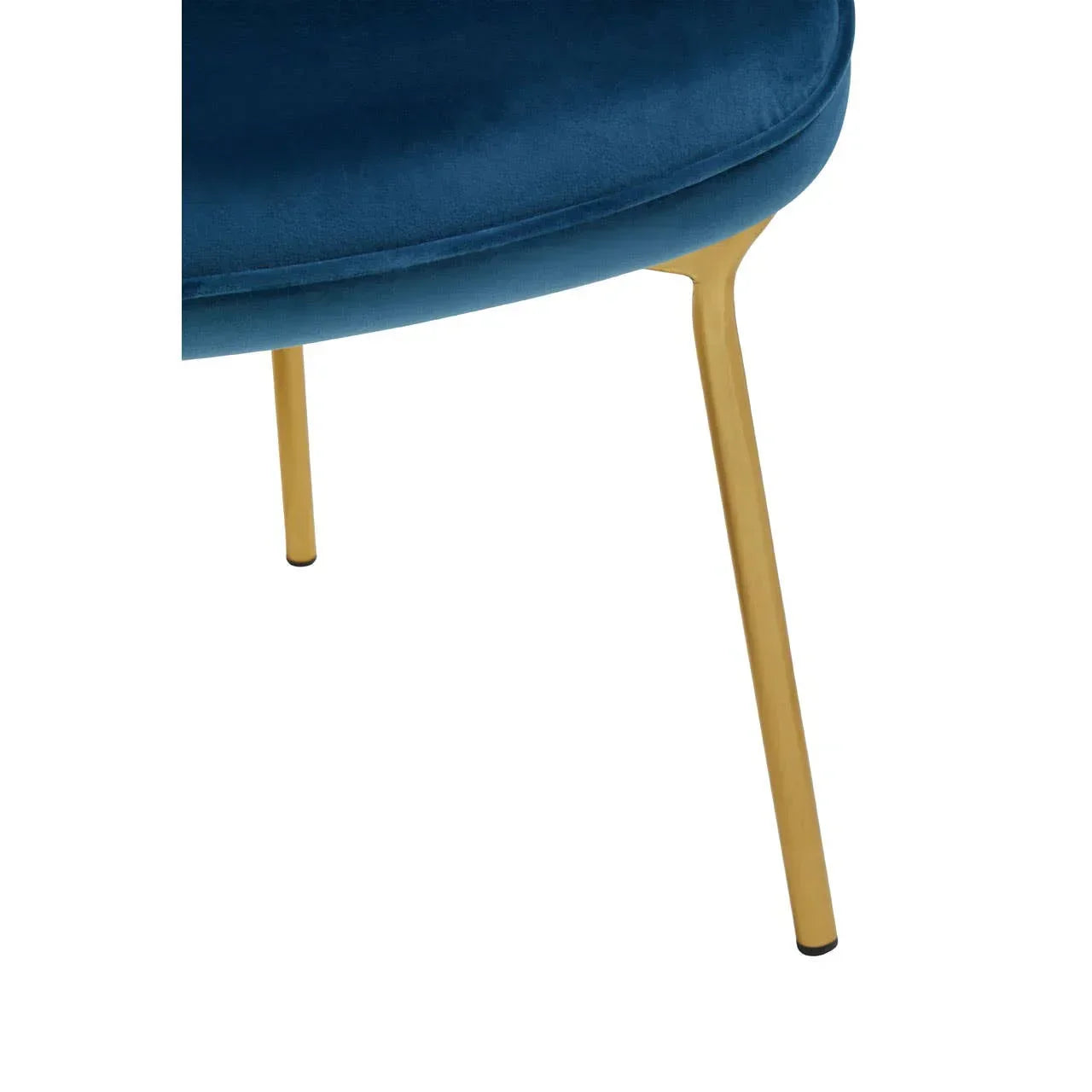 Blue velvet chair seat with gold metal legs, close-up view