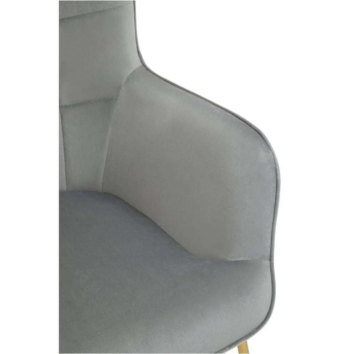 Grey velvet dining chair close-up showing padded seat and armrest detail