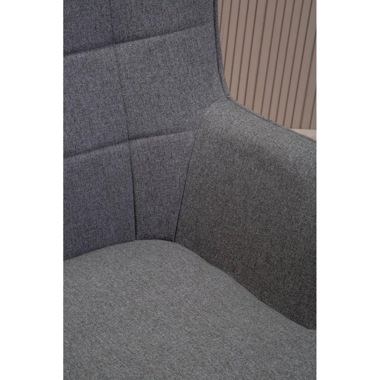 Close up of grey fabric armchair seat and backrest with subtle stitched detailing