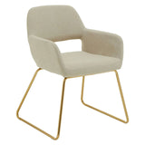 Beige fabric dining chair with gold metal legs and open-back armrests on white background