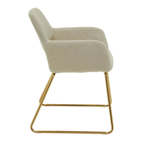 Beige upholstered dining chair with gold metal sled base side view