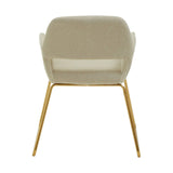 Beige fabric dining chair with gold metal legs, rear view