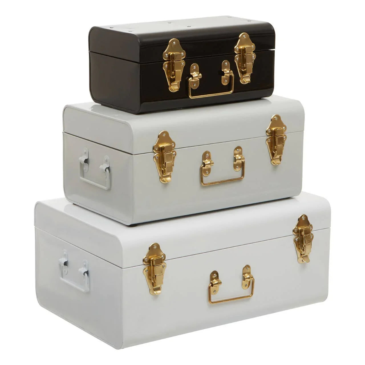 Set of three metal storage trunks in black, grey, and white with gold latches and handles