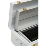 White metal storage trunk with open lid and gold latches, showing interior compartments