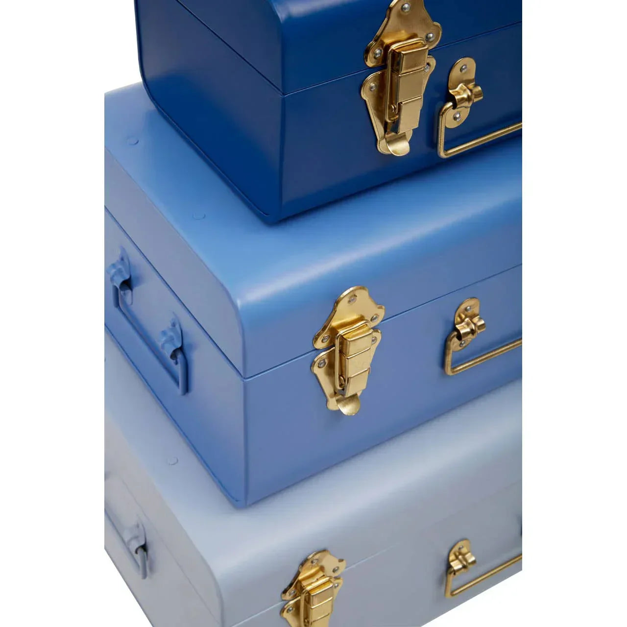 Set of three blue metal storage trunks with gold latches and side handles, stacked