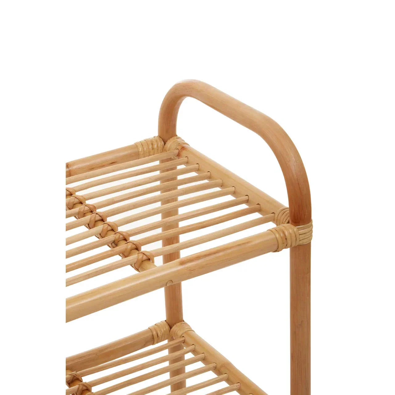 Closeup of two-tier bamboo shelving unit with slatted shelf design