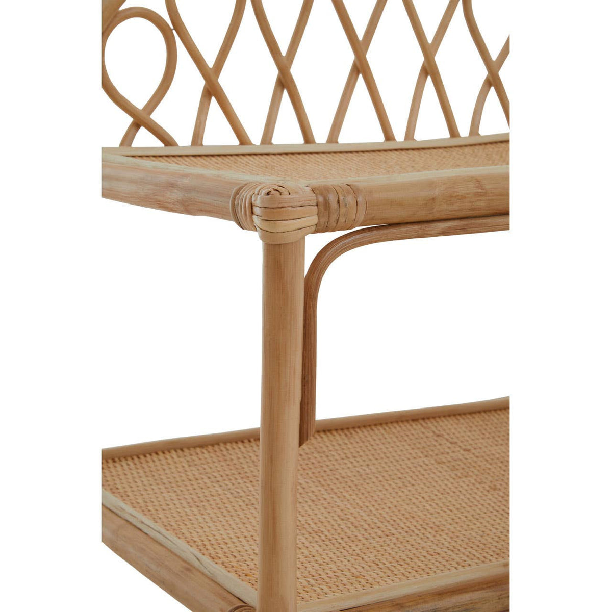 Three-tier shelf unit made of natural rattan, featuring a woven design on the back and a sturdy frame. The shelves are spacious and open, showcasing a light, airy aesthetic suitable for home decor