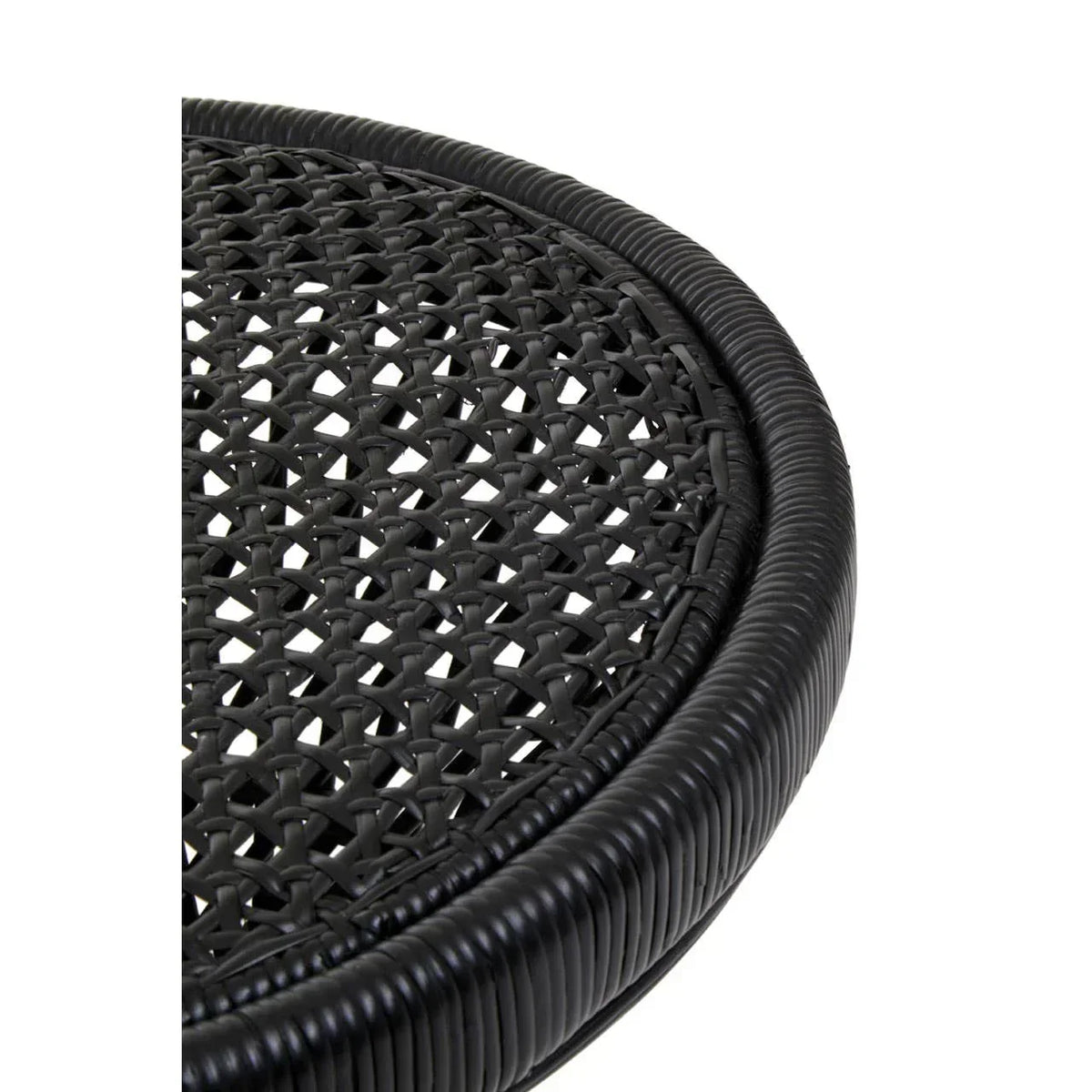 Close-up of black rattan table top with woven outdoor furniture detail