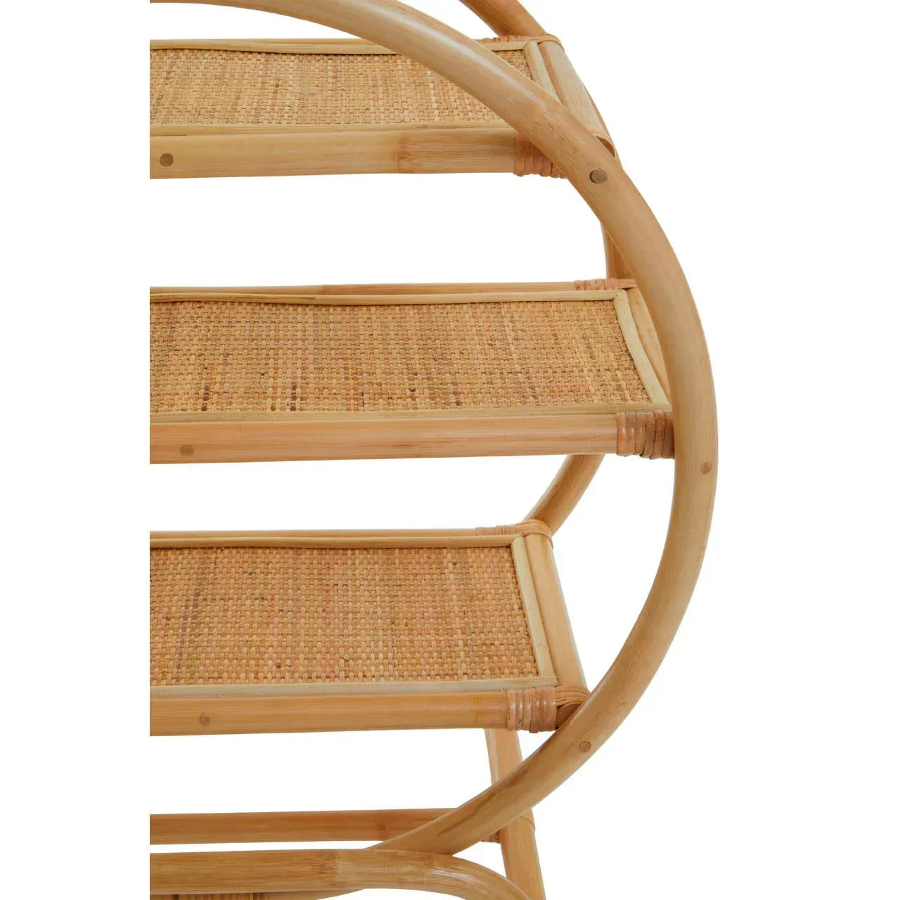 Round rattan shelving unit with woven shelves and natural bamboo frame, side angle view