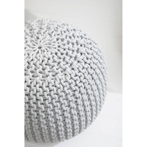 A round grey knit pouffe with a textured surface, featuring a pattern of interwoven yarn that creates a cozy and inviting look, placed against a light-colored background