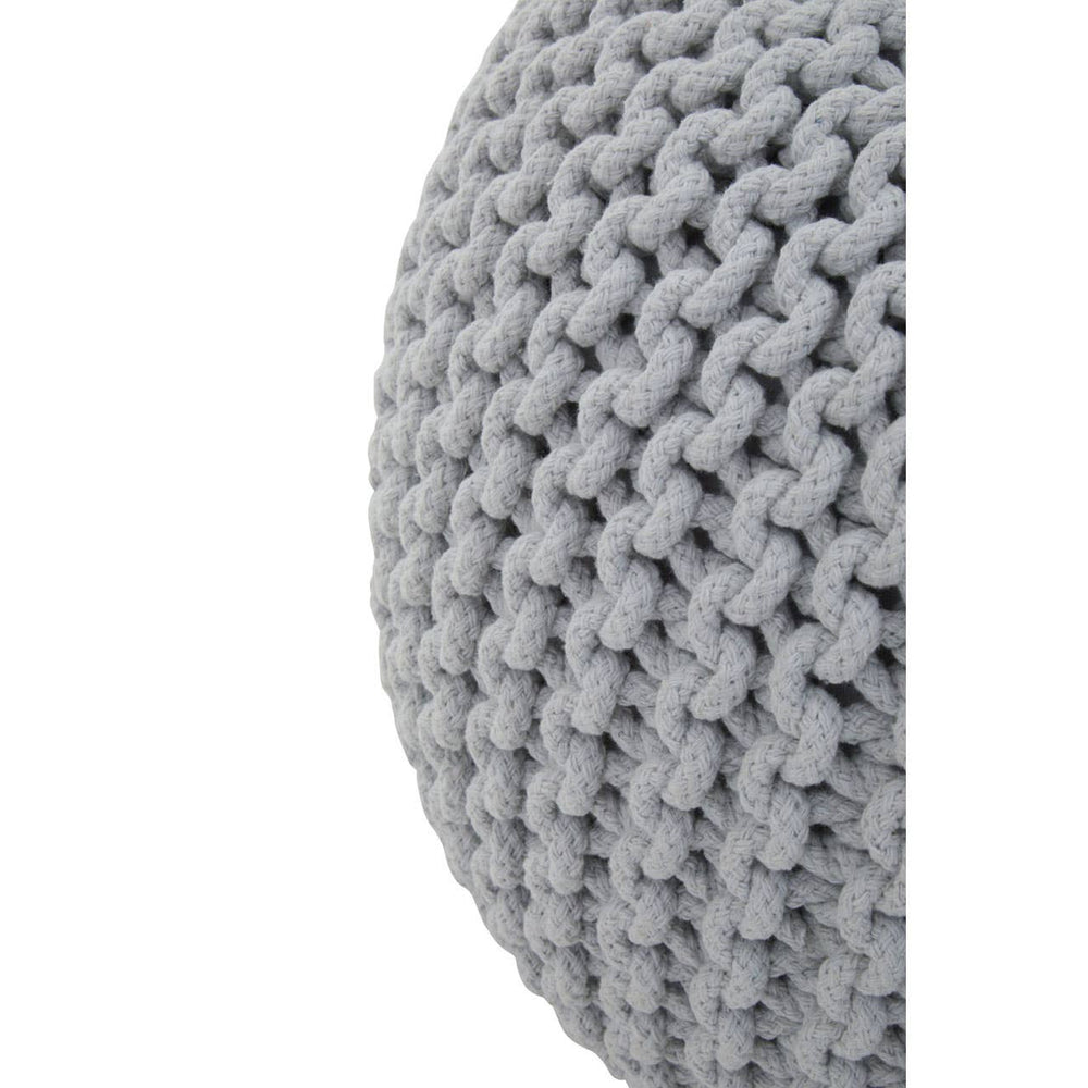 A close-up view of a round grey knit pouffe, showcasing its textured, woven pattern and soft fabric. The pouffe has a smooth, rounded shape and is designed for comfort and style in a children's room