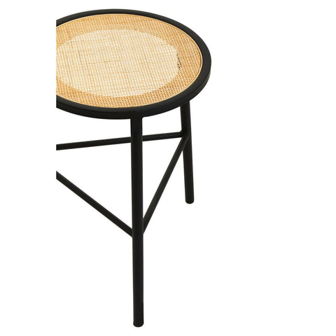 Round stool featuring a natural rattan seat and sleek black metal legs, designed with a minimalist aesthetic. The stool has a woven texture on the seat and a sturdy tripod base for stability