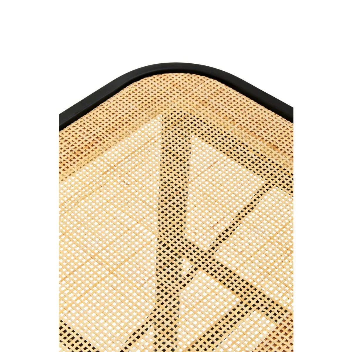 Closeup of woven cane chair seat with black frame, showing texture and pattern