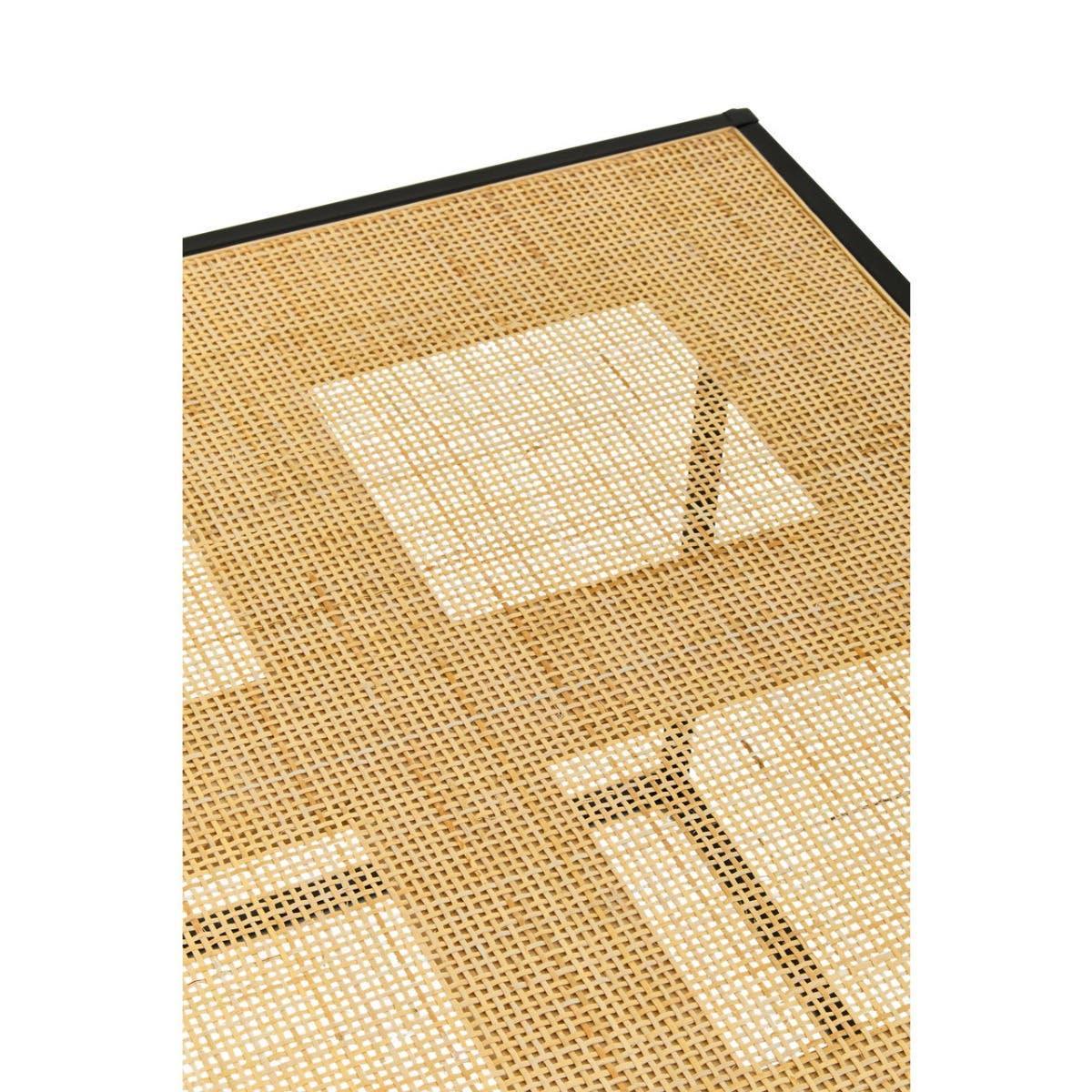 Close up of rattan dining table top with black metal edge and woven cane detail