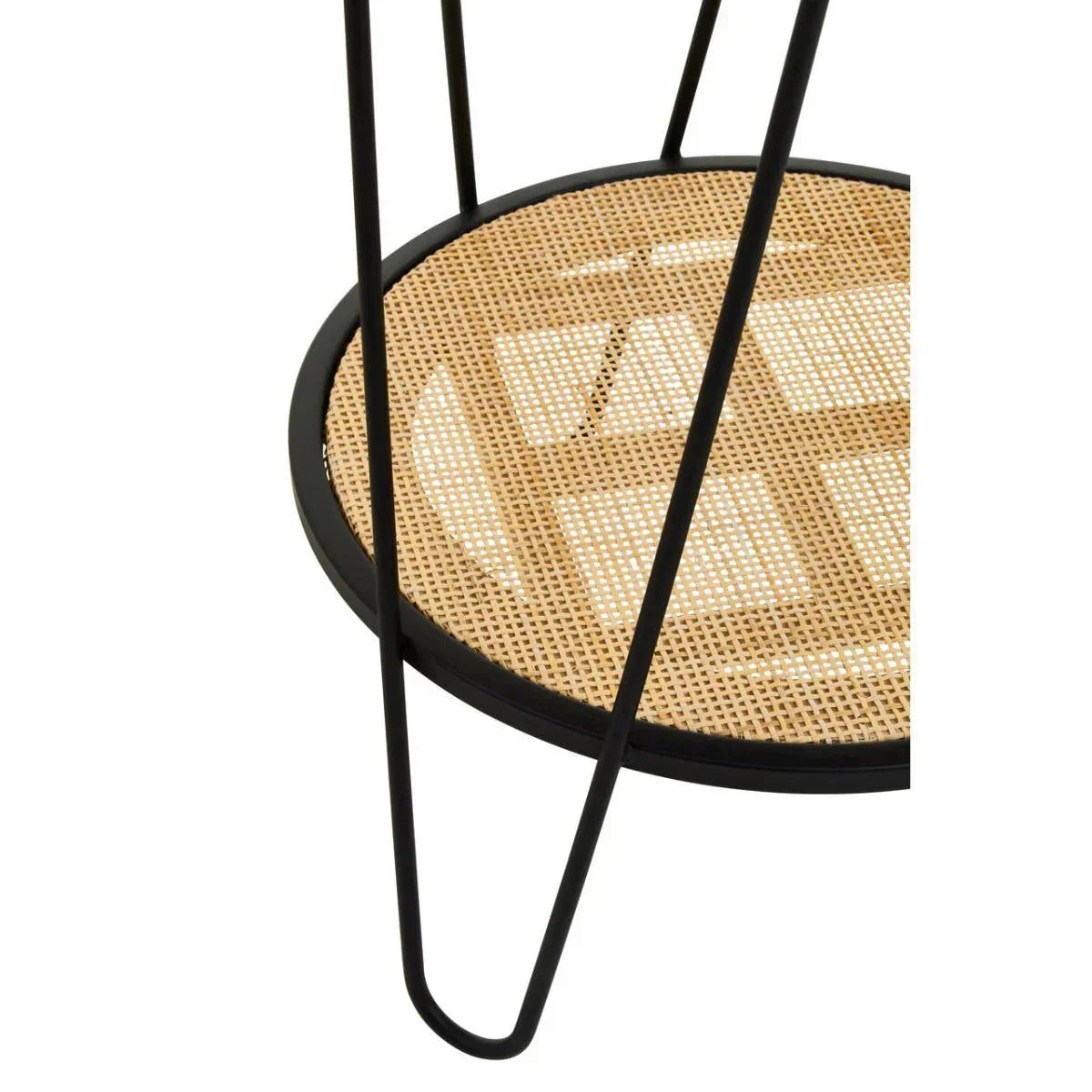 Close-up of round rattan side table shelf with black metal frame and hairpin legs