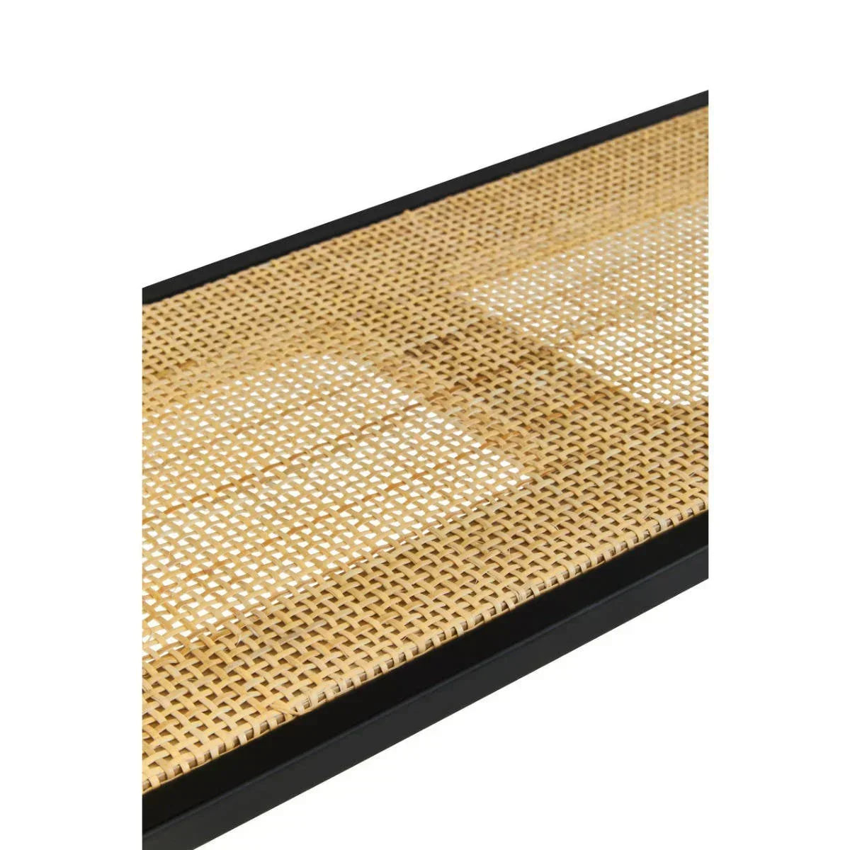 Closeup of rattan furniture detail with black metal frame and woven cane panel