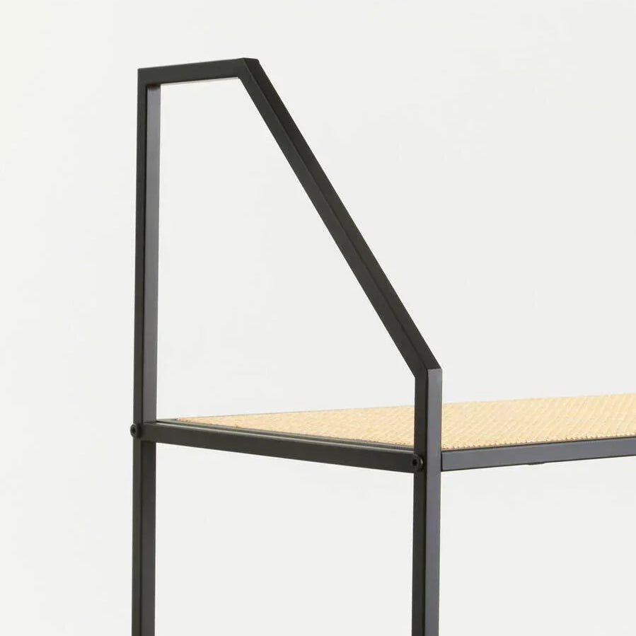 Close-up of black metal frame shelf with light wood surface and modern angular design