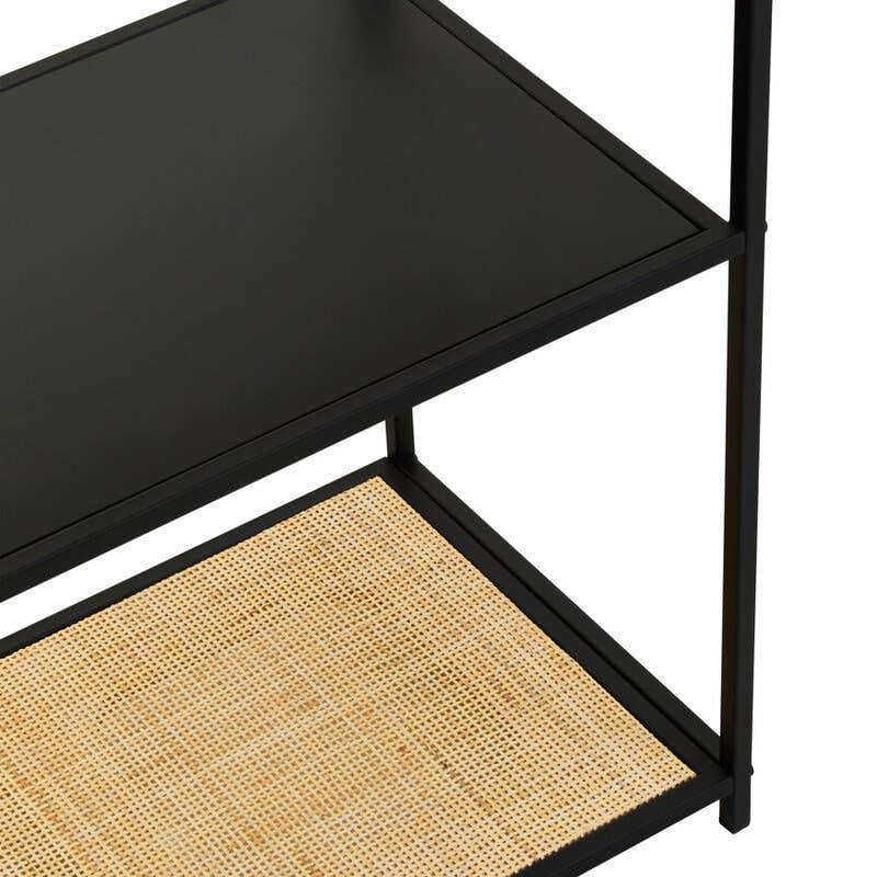 Black metal shelving unit with woven rattan lower shelf and matte black upper shelf