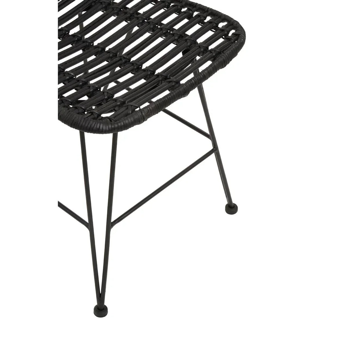 Close up of black rattan chair seat with metal frame and angled legs
