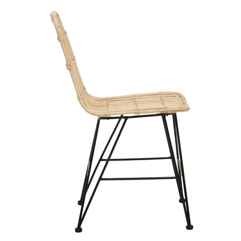 Side view of rattan dining chair with black metal legs and woven seat
