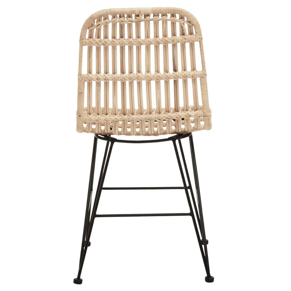 Natural rattan dining chair with black metal legs, front view