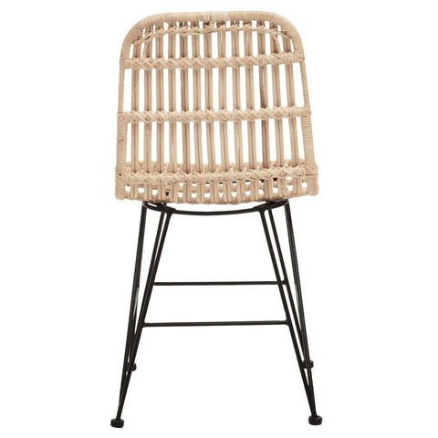 Natural rattan dining chair with black metal legs, front view