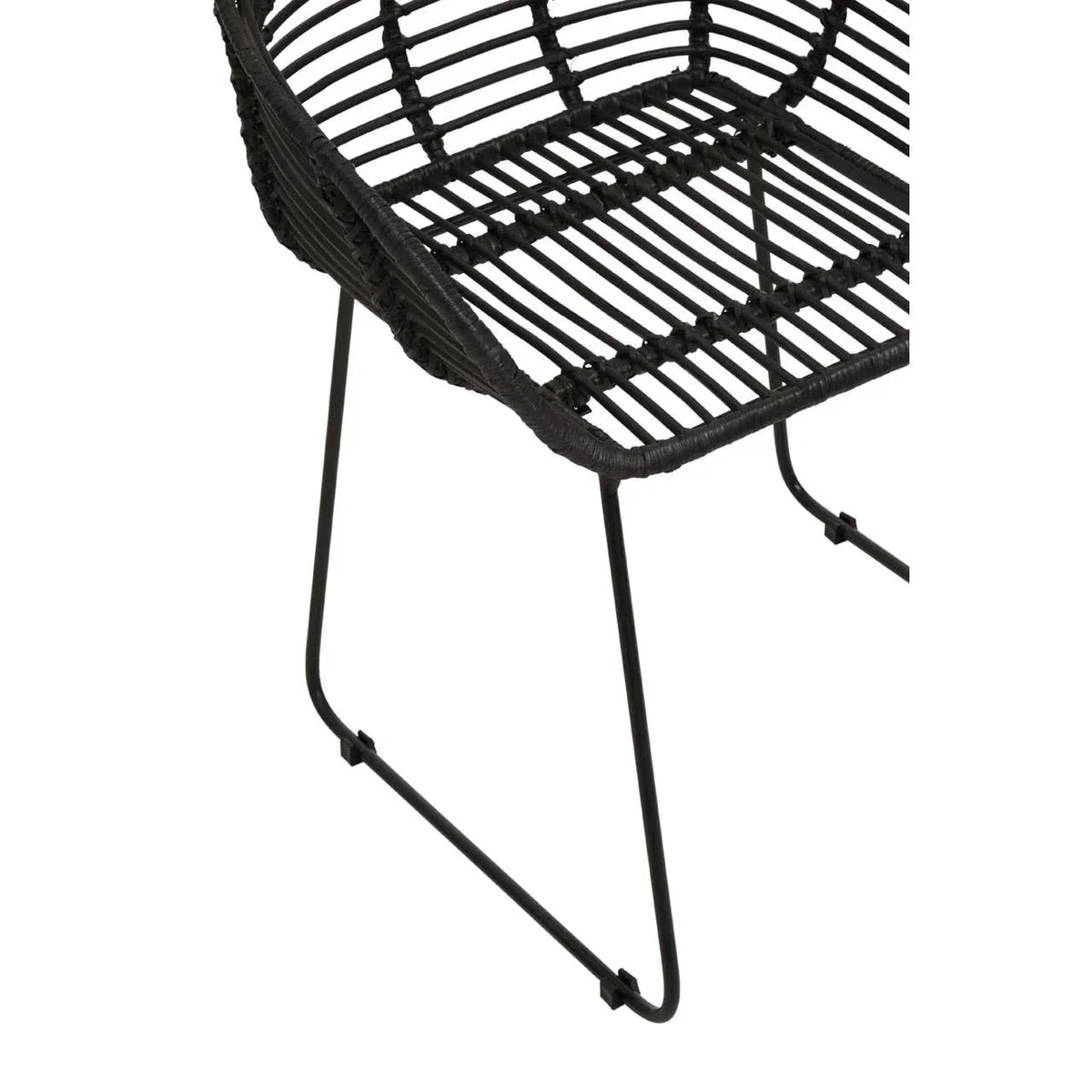 Black rattan dining chair with metal legs, partial side view showing seat and frame