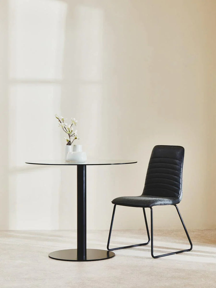 Sleek Black Glass Dining Table