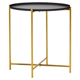 Round black top side table with a sleek gold metal frame, featuring four slender legs and a crossbar for stability. The design is modern and minimalistic, suitable for various home decor styles