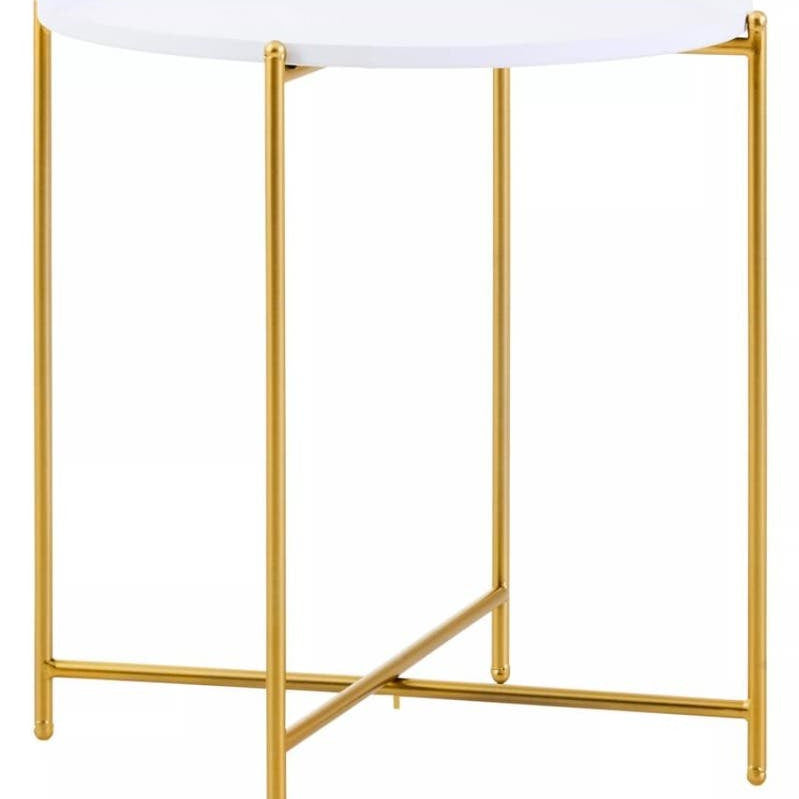 Round white tabletop supported by a sleek gold metal frame with four legs and a crossbar for stability. The design is modern and elegant, suitable for various home decor styles