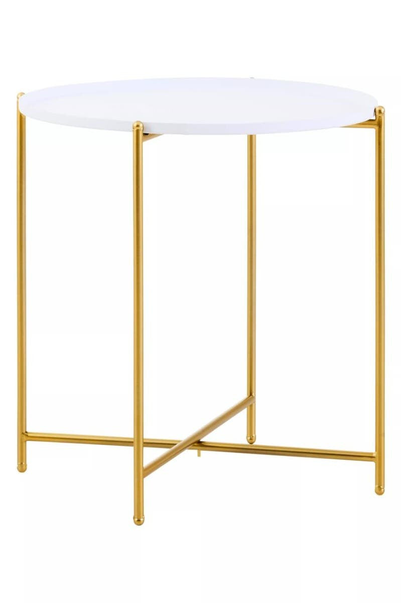 Round white tabletop supported by a sleek gold metal frame with four legs and a crossbar for stability. The design is modern and elegant, suitable for various home decor styles