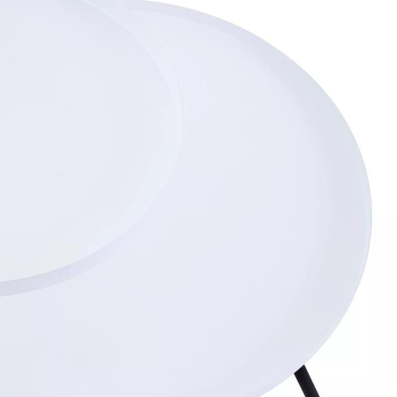 A modern side table featuring two circular white tabletops of varying sizes, supported by a sleek black leg. The design is minimalist and contemporary, suitable for various home decor styles