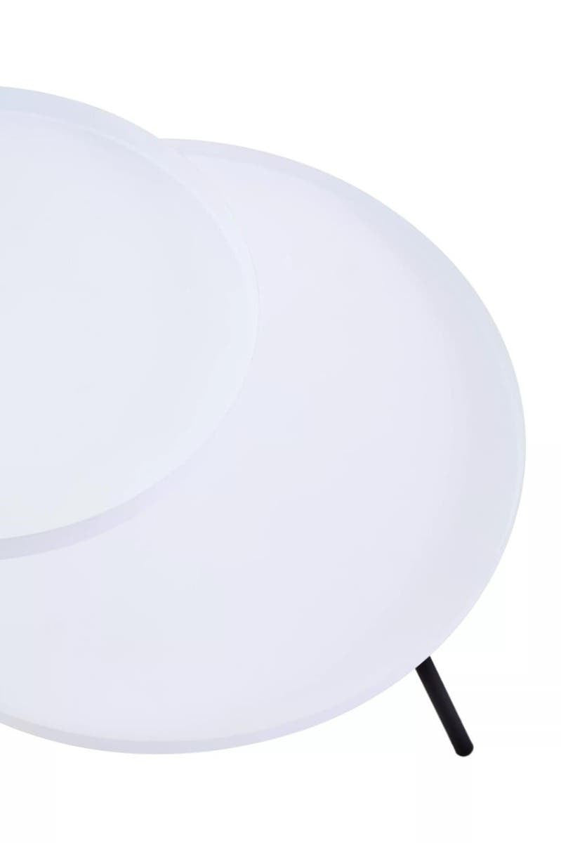 A modern side table featuring two circular white tabletops of varying sizes, supported by a sleek black leg. The design is minimalist and contemporary, suitable for various home decor styles